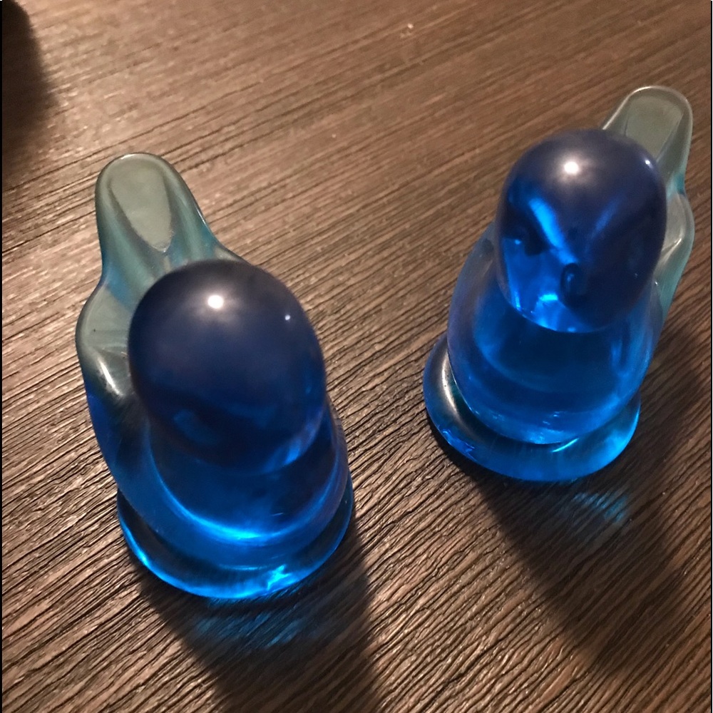 A pair of Blue glass sculpted birds